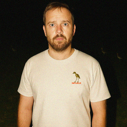 Model wearing Curlew graphic tee with illustrated bush stone-curlew, Darwin NT